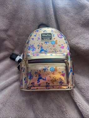 Loungefly Rose Gold Disney Parks Mini Backpack with Character Print